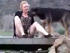 Outside, a gorgeous English woman is stroking her cunt.